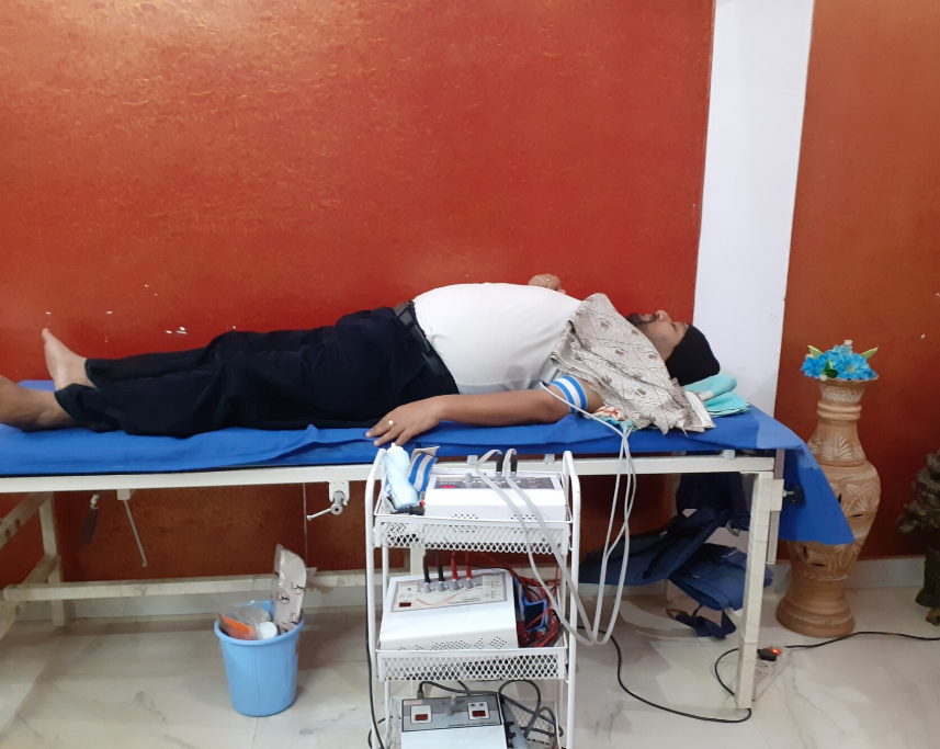 Electrotherapy session in progress