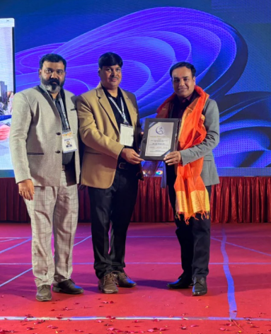 Dr. D.K. Dubey receiving recognition award